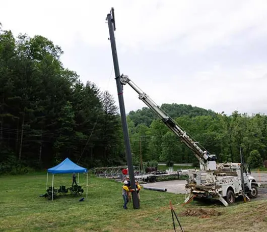 Handling a utility pole