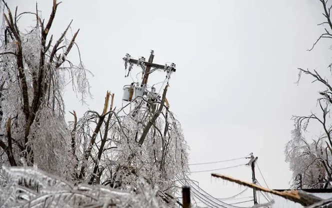 Utility pole in snow storm
